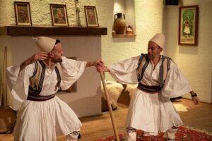 Albanian Night Show: Traditional Music, Dance & Dinner in Tirana - Costumes and the Kanun: what you learn while you’re getting dressed