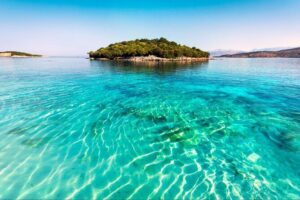 Ksamil Blue Eye and Saranda Day Tour from Tirana Durres Golem - Getting to Ksamil: Beach Time, Island Views, and Corfu-Spotting