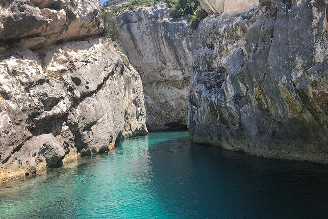 Secret Blue Gem Cave & Grama Bay Boat Tours Vlore - The Crew and the Vibe: Music, Safety Gear, and a Fun Captain