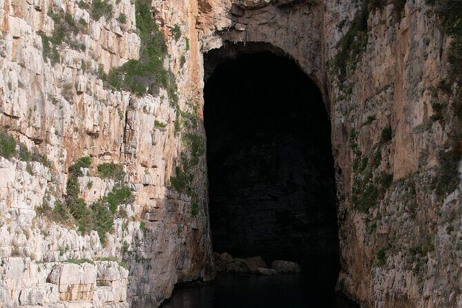 Vlore Private Boat Tour Blue Cave & Grama Bay Adventure - Haxhi Ali Cave: swimming inside wild shapes and crystal blue water