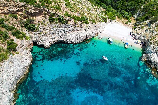 Vlore Private Boat Tour Blue Cave & Grama Bay Adventure - Smuggler’s Canyon and Seal Cave: narrow seas, big rocks, quick snorkel windows